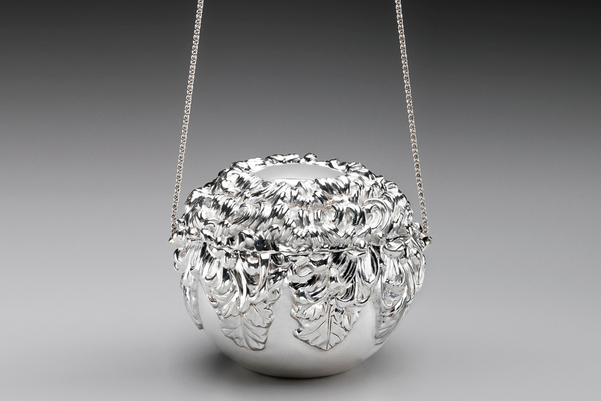 Sterling silver and 24K gold 'Evening Glory Purse' designed by Michael Galmer.